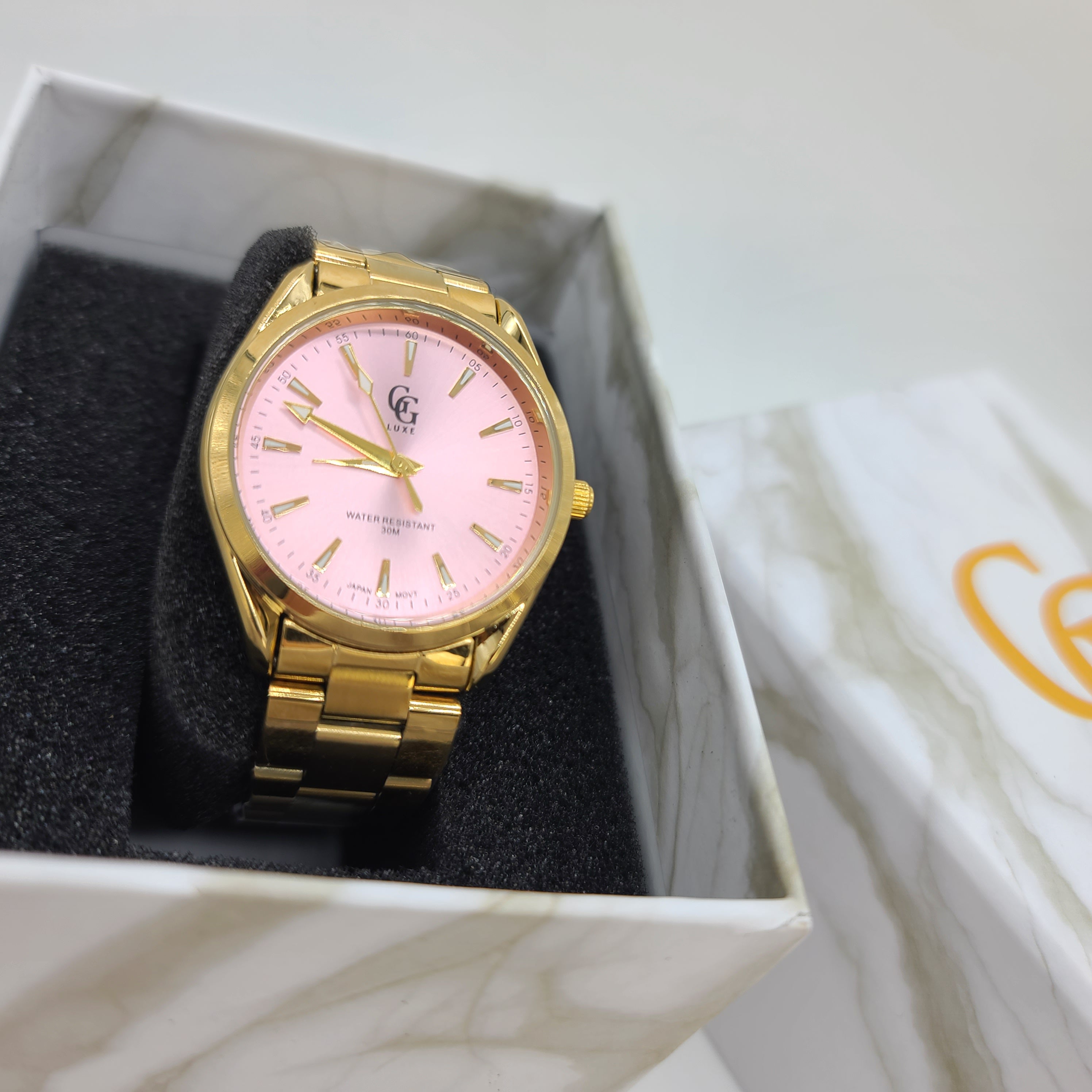 Montre étanche en acier inoxydable fond rose